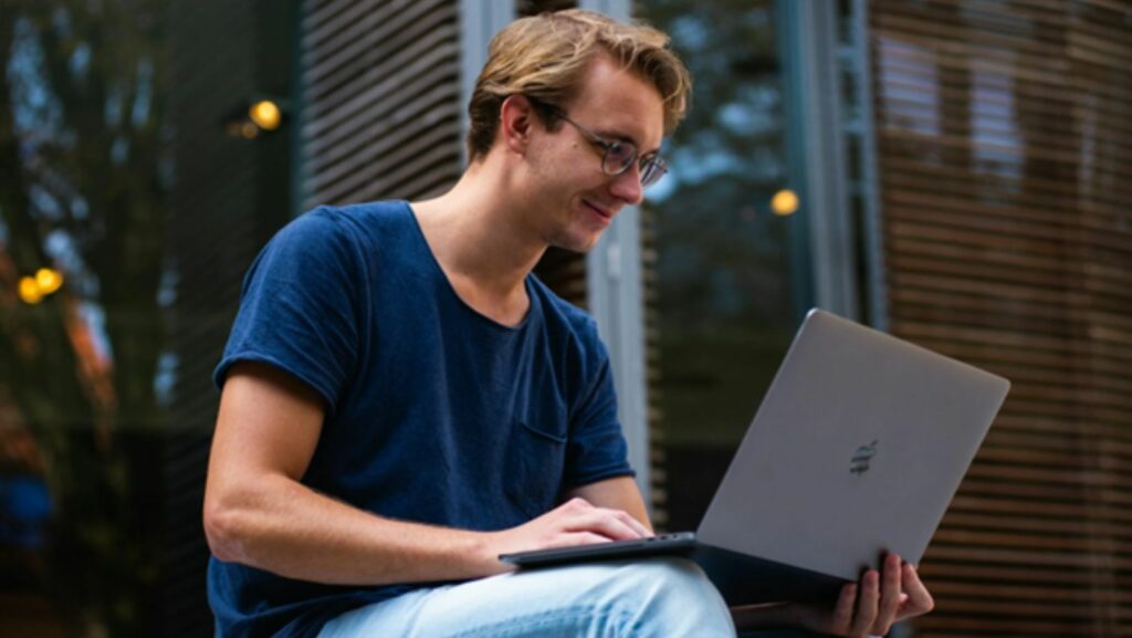 A man using a laptop